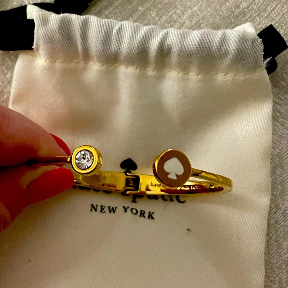 Kate Spade gold and white spade bracelet